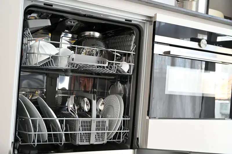 Dishes in an open dishwasher
