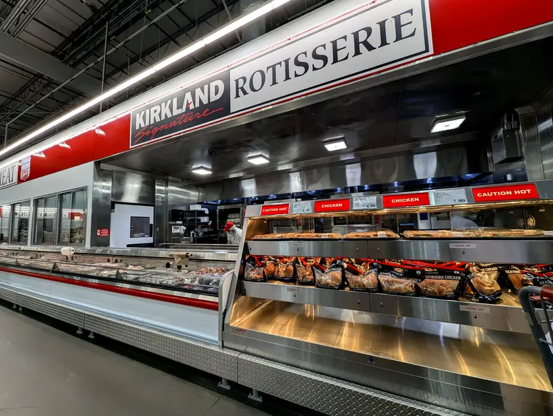 Kirkland Signature Costco rotisserie chicken on shelf new packaging bags